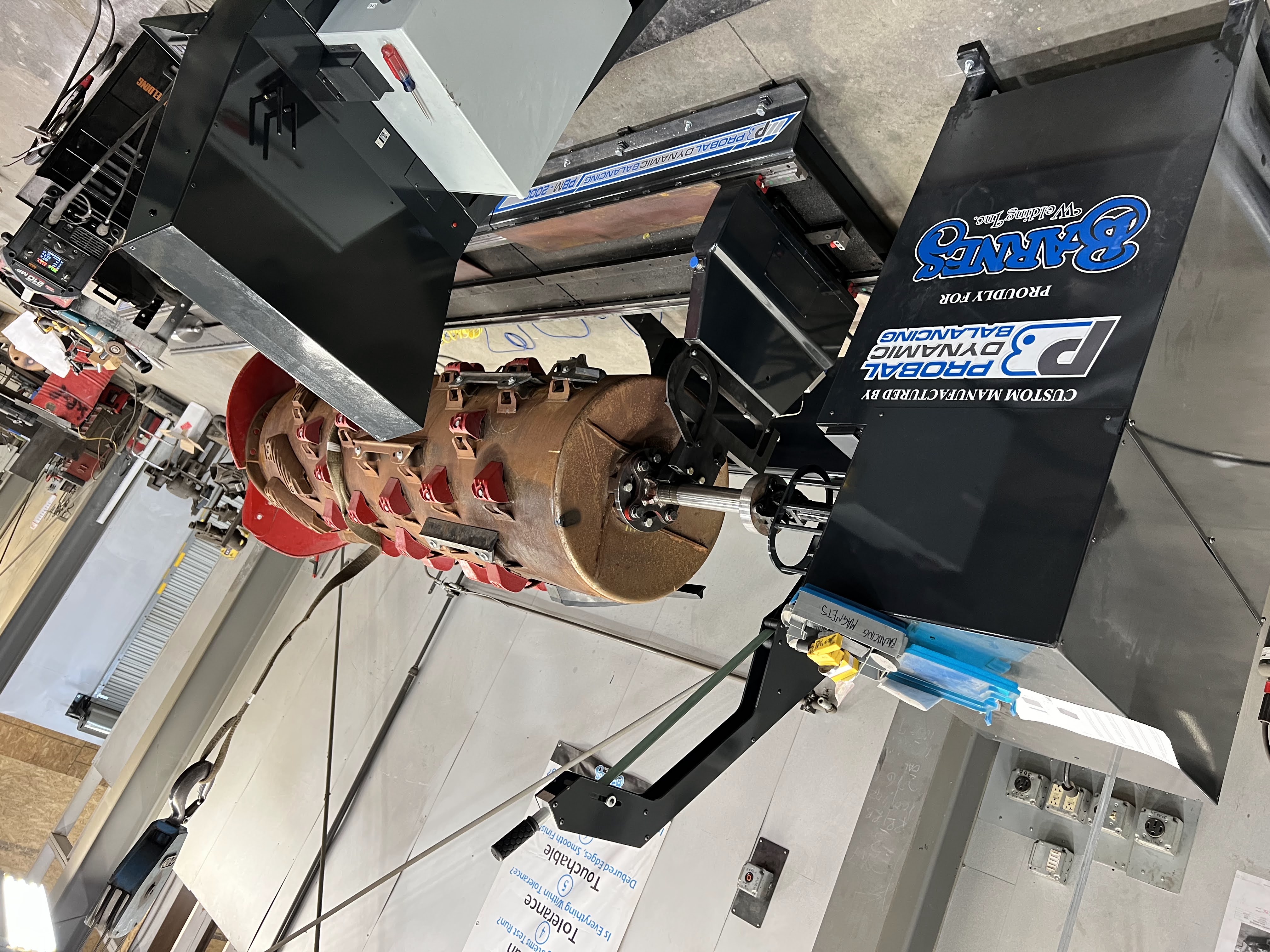 Barnes equipment used to support rotating header and auger work