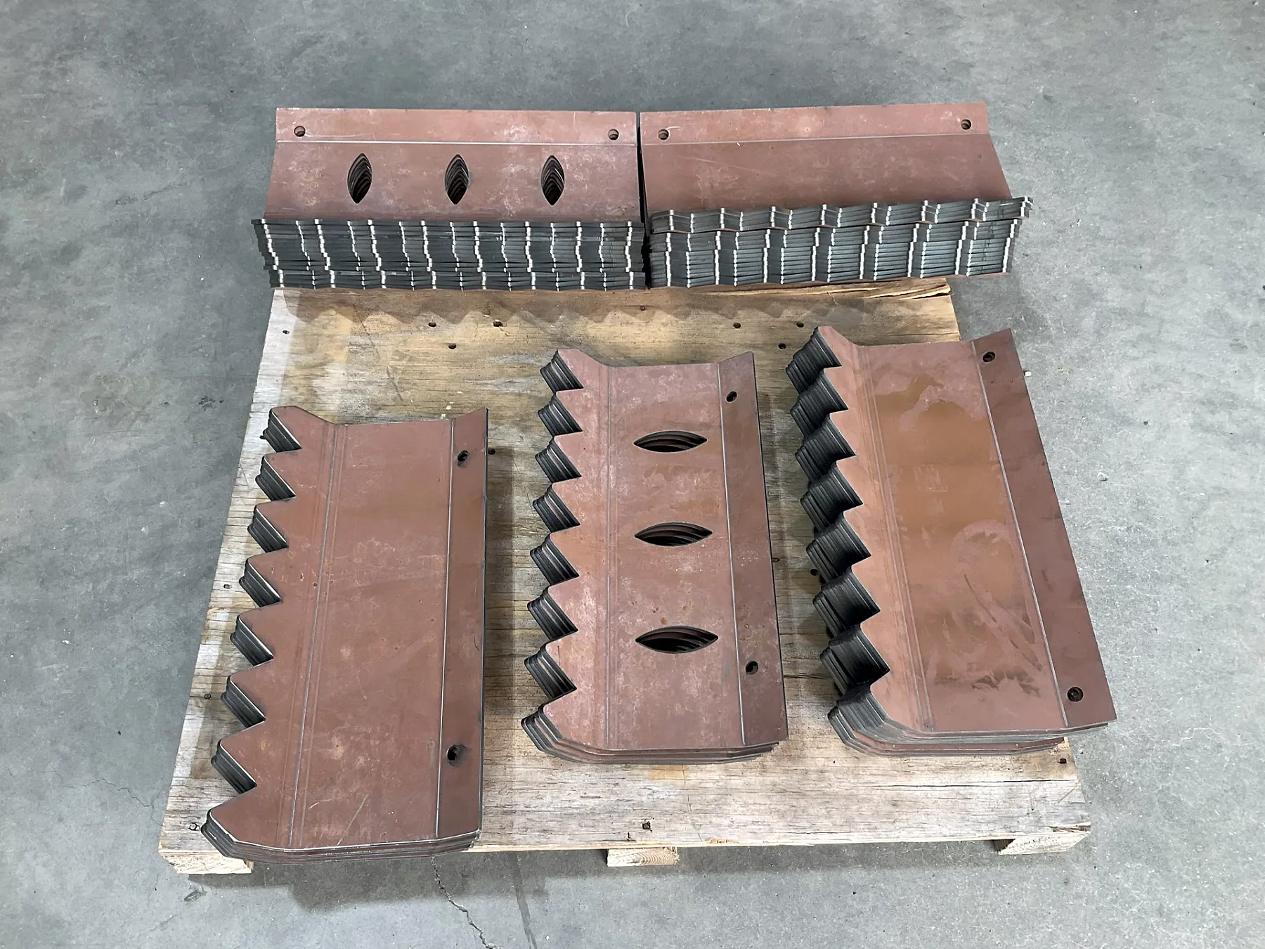 Stacks of repeat-cut steel plate components in the Barnes shop